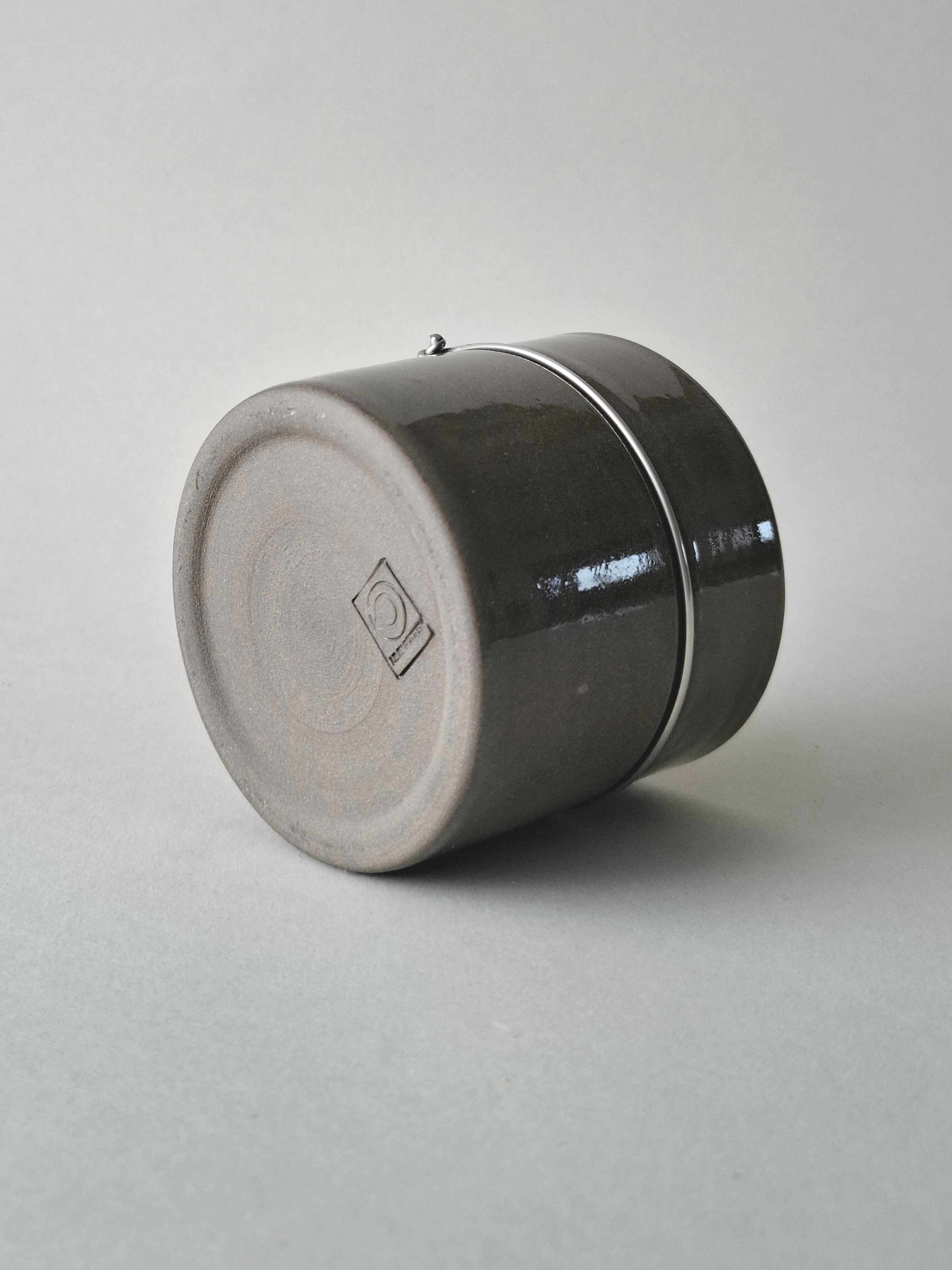 Handmade stoneware cup with anthracite glaze and signature stainless steel wire join. Wheel-thrown in Berlin. One of a kind.